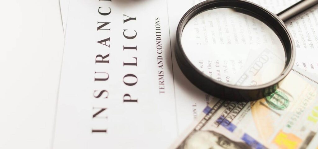 magnifying glass on dental and orthodontic insurance coverage summary
